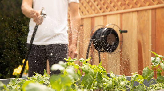 Wall mounted garden hose reel